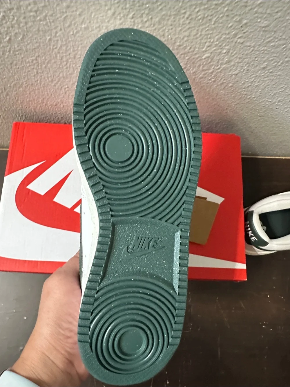 Nike White Low-Top Sneakers with Dark Green Swoosh and Heel